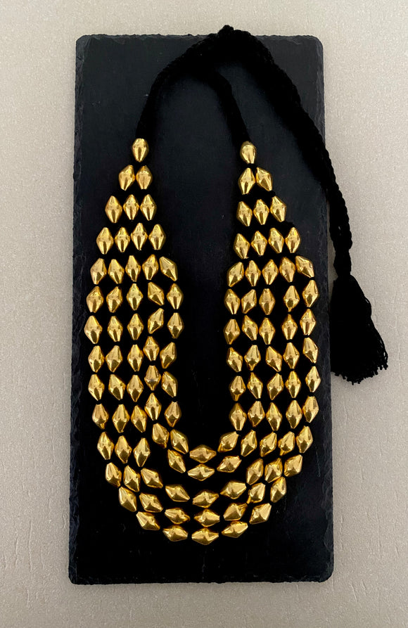 Dholki Beads small five strand gold