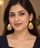Opulent Gold Textured Oval Earrings