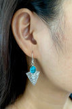 Trendy turquoise carved triangular drops