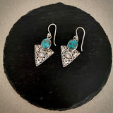 Trendy turquoise carved triangular drops
