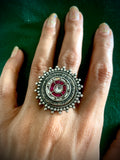 Opulent small round star ring